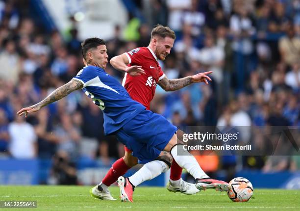 Alexis Mac Allister of Liverpool is challenged by Enzo Fernandez of Chelsea during the Premier League match between Chelsea FC and Liverpool FC at...