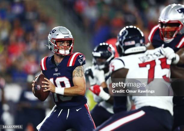 Trace McSorley of the New England Patriots looks to pass during the third quarter during the preseason game against the Houston Texans at Gillette...