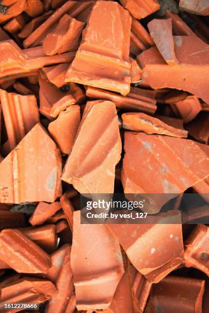 broken terracotta roof tiles background - roof tile stock pictures, royalty-free photos & images
