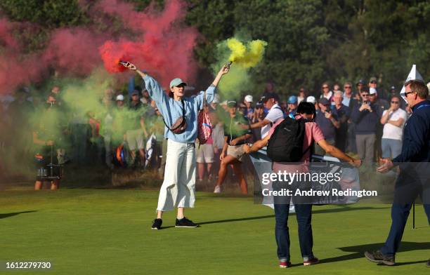 Protestors make their way onto the 17th green on Day Four of the AIG Women's Open at Walton Heath Golf Club on August 13, 2023 in Tadworth, England.