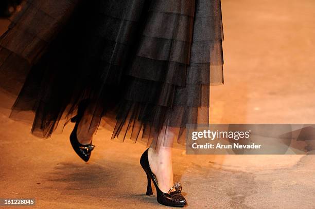 Model walks the runway at the Christian Siriano Fall 2013 fashion show with Payless ShoeSource during Mercedes-Benz Fashion Week at Eyebeam on...