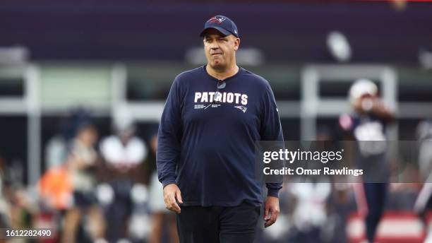 Offensive coordinator Bill O'Brien looks on before the preseason game against the Houston Texans at Gillette Stadium on August 10, 2023 in...