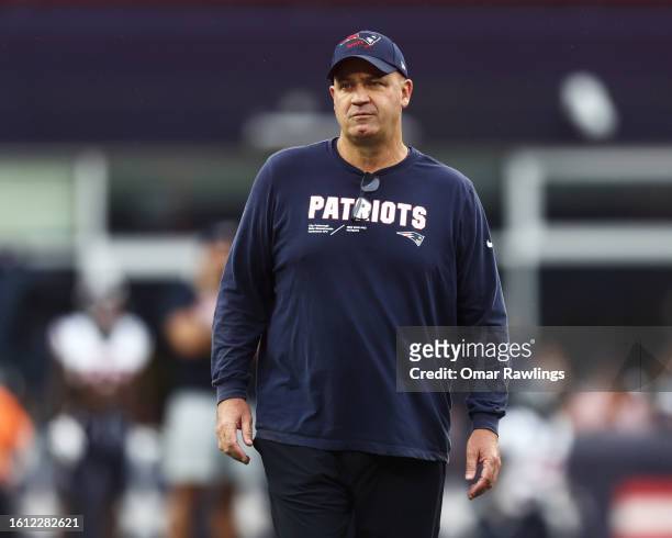 Offensive coordinator Bill O'Brien looks on before the preseason game against the Houston Texans at Gillette Stadium on August 10, 2023 in...