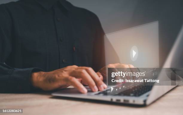 moman using mouse and keyboard for streaming online on virtual screen, watching video on internet, live concert, show or tutorial, content online - real time stock pictures, royalty-free photos & images