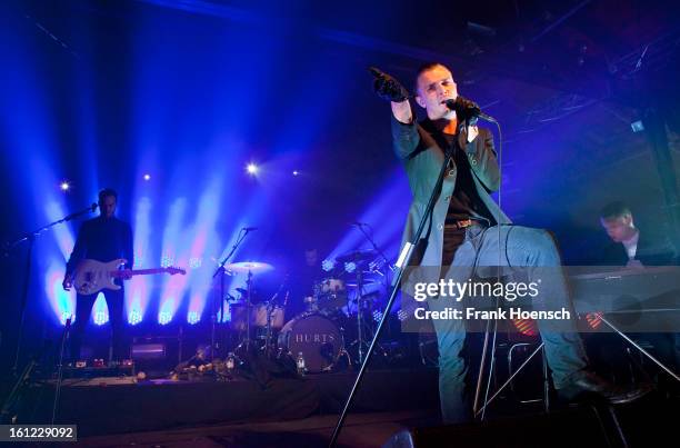 Singer Theo Hutchcraft of Hurts performs live during a concert at the Postbahnhof on February 9, 2013 in Berlin, Germany.