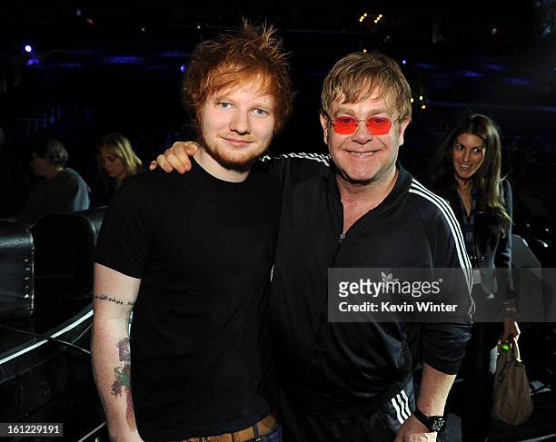 Musicians Ed Sheeran and Elton John pose backstage during the 55th Annual GRAMMY Awards at the STAPLES Center on February 9, 2013 in Los Angeles,...