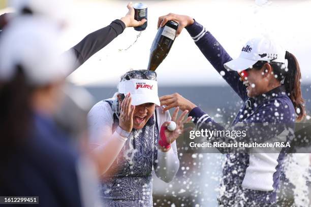 Lilia Vu of the United States celebrates as drinks are poured on her on the 18th green on Day Four of the AIG Women's Open at Walton Heath Golf Club...