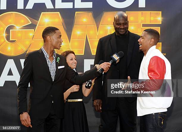 Actors Jessie Usher and Aimee Carrero, host Shaquille O'Neal and co-host Nick Cannon attend the Third Annual Hall of Game Awards hosted by Cartoon...