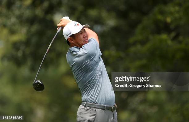 Byeong Hun An of South Korea plays his shot from the seventh tee during the final round of the FedEx St. Jude Championship at TPC Southwind on August...