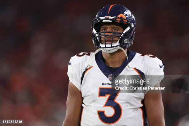 Quarterback Russell Wilson of the Denver Broncos on the sidelines during the NFL game at State Farm Stadium on August 11, 2023 in Glendale, Arizona....