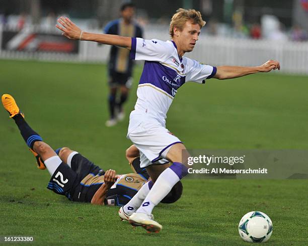 Defender Brian Fekete of Orlando City runs upfield against the Philadelphia Union February 9, 2013 in the first round of the Disney Pro Soccer...