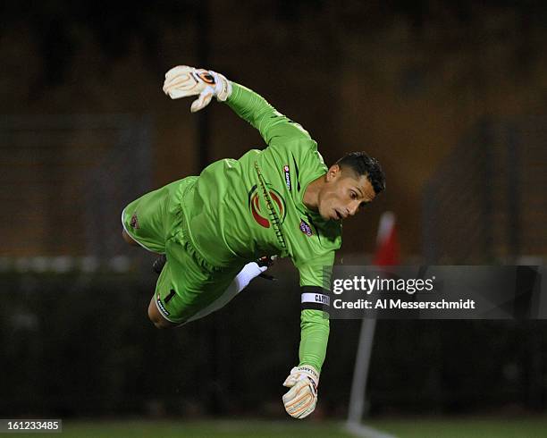 Goalie Miguel Gallardo of Orlando City dives for a shot against the Philadelphia Union February 9, 2013 in the first round of the Disney Pro Soccer...