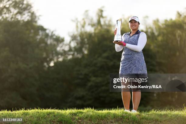 Lilia Vu of the United States poses with the AIG Women's Open trophy on the 18th green on Day Four of the AIG Women's Open at Walton Heath Golf Club...