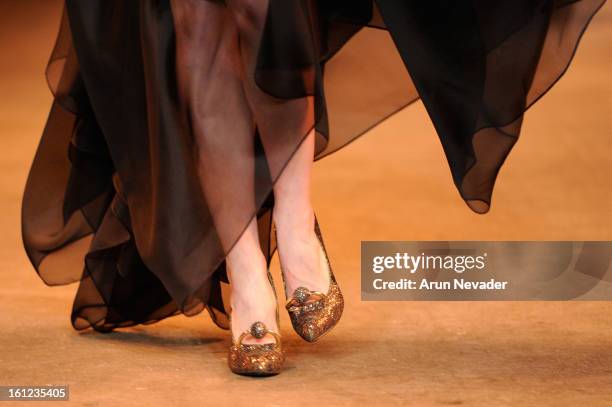 Model walks the runway at the Christian Siriano Fall 2013 fashion show with Payless ShoeSource during Mercedes-Benz Fashion Week at Eyebeam on...