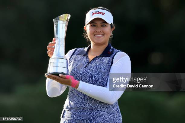 Lilia Vu of The United States holds the AIG Women's Open trophy after her victory in the final round of the AIG Women's Open at Walton Heath Golf...