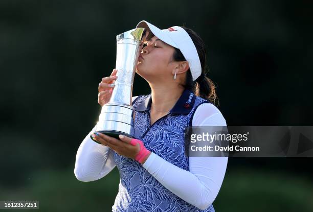 Lilia Vu of The United States kisses the AIG Women's Open trophy after her victory in the final round of the AIG Women's Open at Walton Heath Golf...