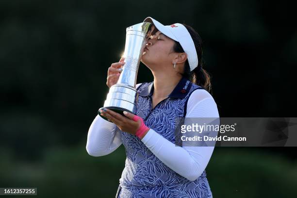 Lilia Vu of The United States kisses the AIG Women's Open trophy after her victory in the final round of the AIG Women's Open at Walton Heath Golf...