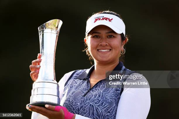 Lilia Vu of the United States lifts the AIG Women's Open Trophy on Day Four of the AIG Women's Open at Walton Heath Golf Club on August 13, 2023 in...