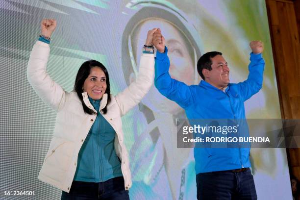 Ecuadorian presidential candidate for the Movimiento Revolucion Ciudadana party, Luisa Gonzalez , celebrates with her supporters next to vice...
