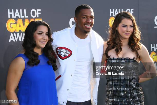 Aly Raisman, Nick Cannon and McKayla Maroney attend the Third Annual Hall of Game Awards hosted by Cartoon Network at Barker Hangar on February 9,...