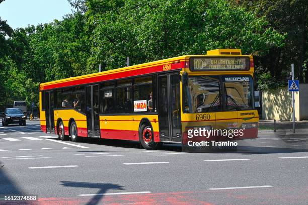 classic neoplan n4020td on a street - warsaw bus stock pictures, royalty-free photos & images