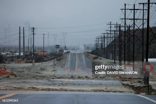 Road is washed out as Tropical Storm Hilary heads north into Palm Springs, California, on August 20, 2023. Heavy rains lashed California as Tropical...