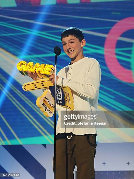 Pro Skateboarder Mitchie Brusco speaks onstage during the Third Annual Hall of Game Awards hosted by Cartoon Network at Barker Hangar on February 9,...