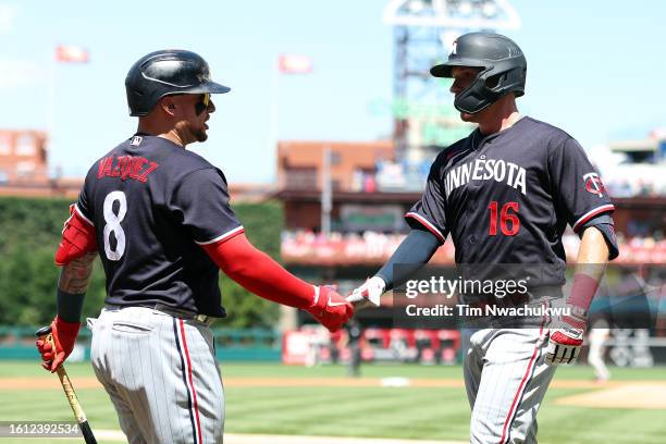 Christian Vazquez and Jordan Luplow of the Minnesota Twins react following a home run hits a by Luplow during the first inning against the...