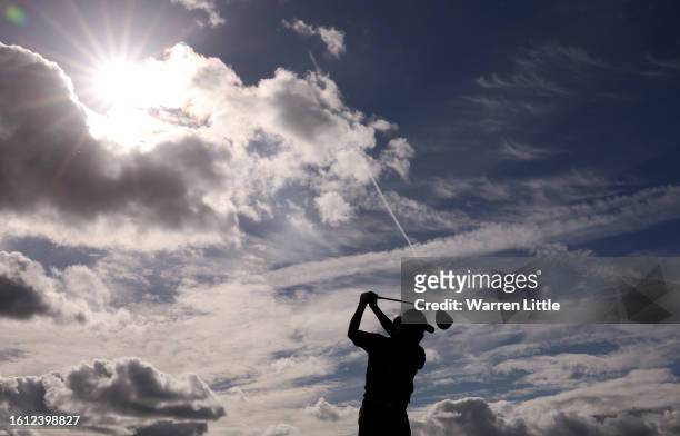 Charley Hull of England tees off on the 12th hole on Day Four of the AIG Women's Open at Walton Heath Golf Club on August 13, 2023 in Tadworth,...