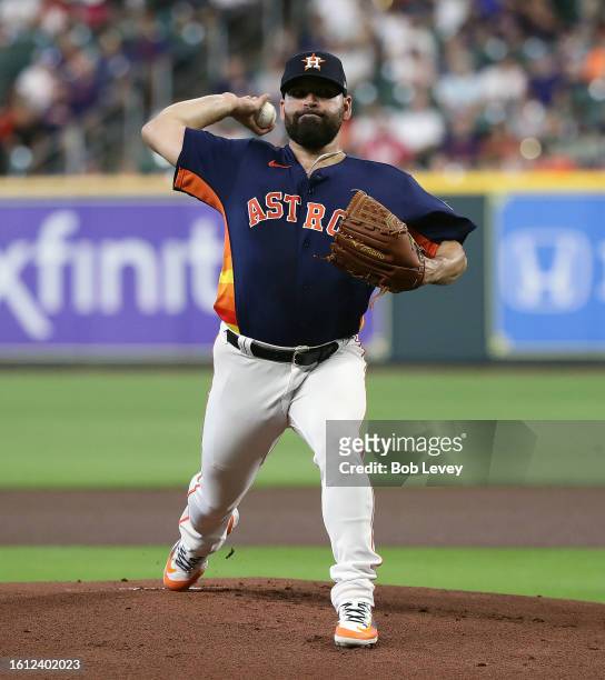 Jose Urquidy of the Houston Astros pitches in the first inning against the Los Angeles Angels at Minute Maid Park on August 13, 2023 in Houston,...