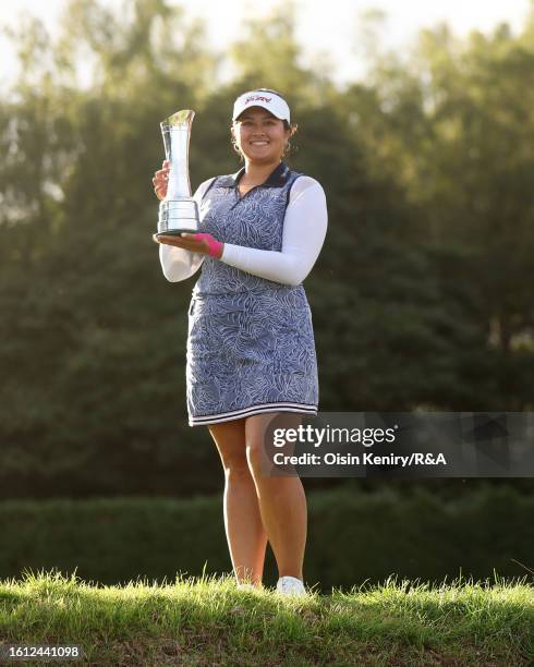 Lilia Vu of the United States poses with the AIG Women's Open trophy on the 18th green on Day Four of the AIG Women's Open at Walton Heath Golf Club...