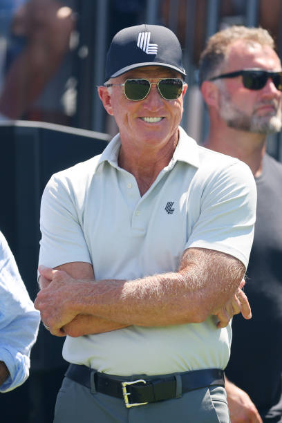 Greg Norman looks on at the first tee prior to the start of day three of the LIV Golf Invitational - Bedminster at Trump National Golf Club on August...
