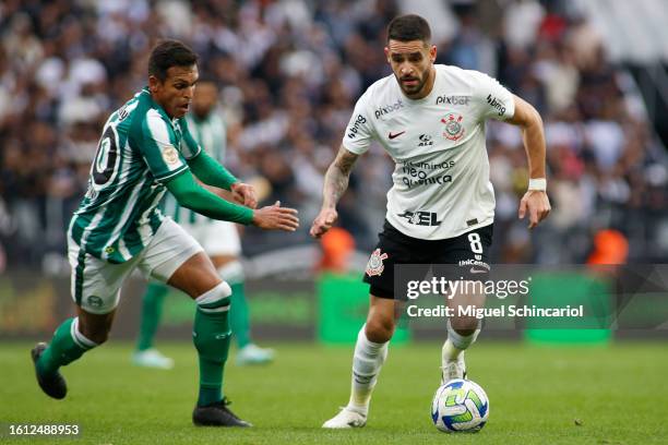 Renato Augusto of Corinthians fight for the ball against Robson of Coritiba during a match between Corinthians and Coritiba as part of Brasileirao...