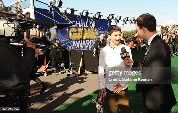 Pro-skater Mitchie Brusco attends the Third Annual Hall of Game Awards hosted by Cartoon Network at Barker Hangar on February 9, 2013 in Santa...
