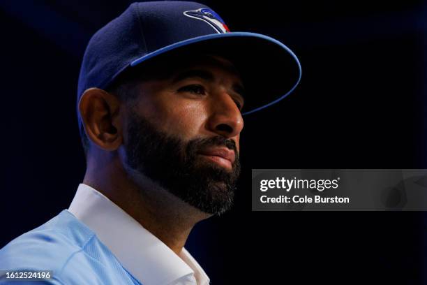 Former Toronto Blue Jay José Bautista speaks during a press conference after signing a one-day contract with the club, at Rogers Centre on August 11,...