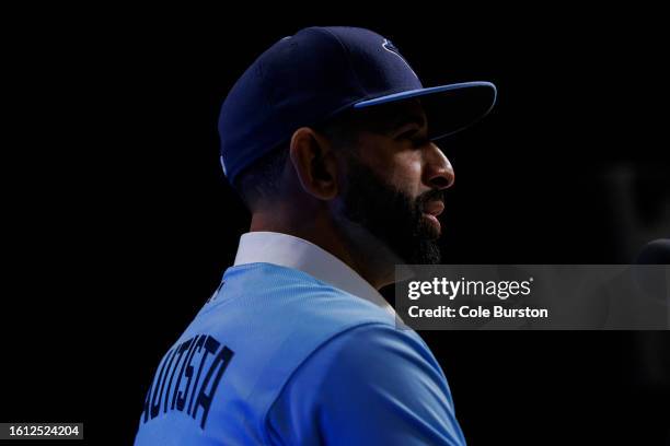 Former Toronto Blue Jay José Bautista speaks during a press conference after signing a one-day contract with the club, at Rogers Centre on August 11,...