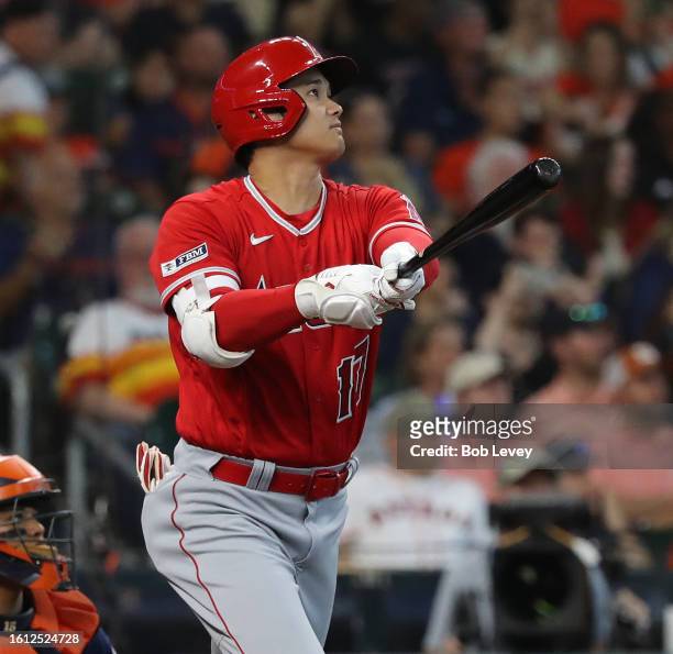 Shohei Ohtani of the Los Angeles Angels hits a home run in the sixth inning against the Houston Astros at Minute Maid Park on August 13, 2023 in...