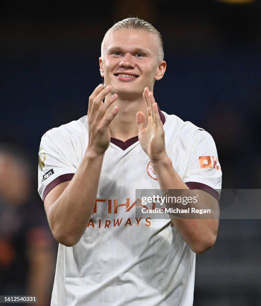 Erling Haaland of Manchester City gestures to fans after the Premier League match between Burnley FC and Manchester City at Turf Moor on August 11,...