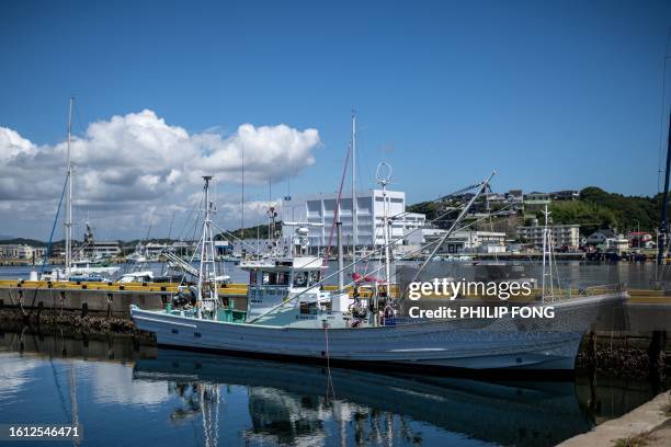 Fishing boats are moored at Onahama port in Iwaki city, Fukushima Prefecture, some 45 kms south of the crippled Fukushima Daiichi nuclear plant on...