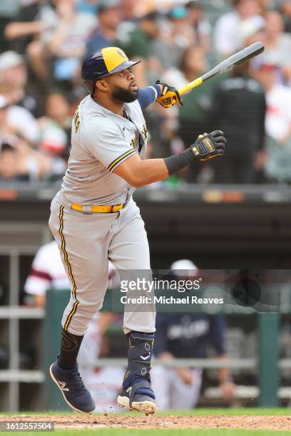 Carlos Santana of the Milwaukee Brewers watches his three-run home run off Aaron Bummer of the Chicago White Sox during the eighth inning at...