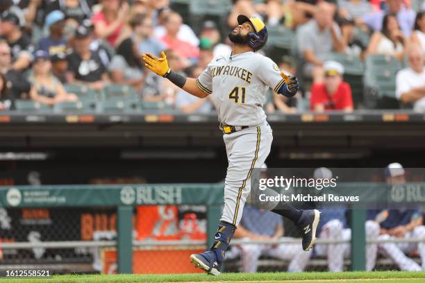 Carlos Santana of the Milwaukee Brewers celebrates his three-run home run off Aaron Bummer of the Chicago White Sox during the eighth inning at...