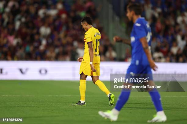 Raphinha of FC Barcelona walks off the pitch after being sent off during the LaLiga EA Sports match between Getafe CF and FC Barcelona at Coliseum...