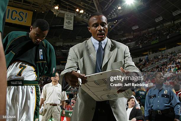 Head Coach Dwane Casey of the Seattle SuperSonics draws the play during a timeout against the Cleveland Cavaliers in Seattle, Washington DIGITAL...
