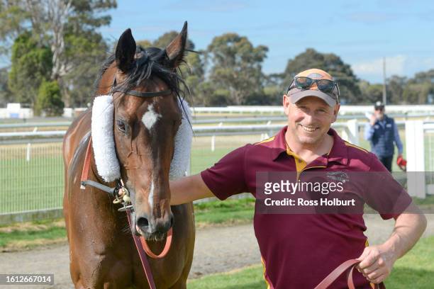 Daniel Williams with Wave The Wand after winning the Viatek 4YO+ Special Ballot Maiden at Bairnsdale Racecourse on August 21, 2023 in Bairnsdale,...