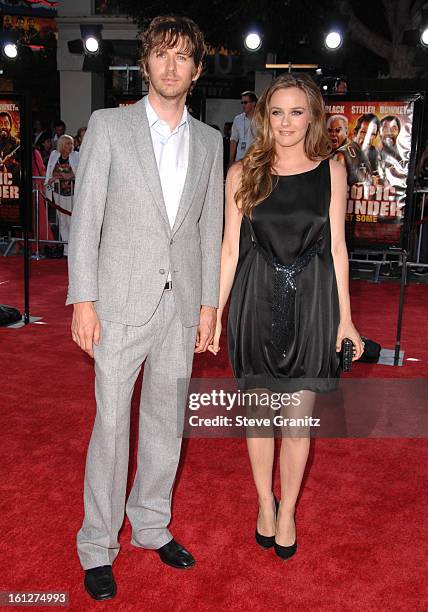 Alicia Silverstone and husband Christopher Jarecki arrives at the Los Angeles Premiere Of "Tropic Thunder" at the Mann's Village Theater on August...