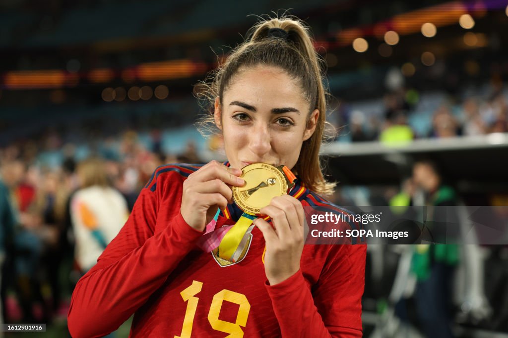 Olga Carmona captain of Spain celebrates with her medal...