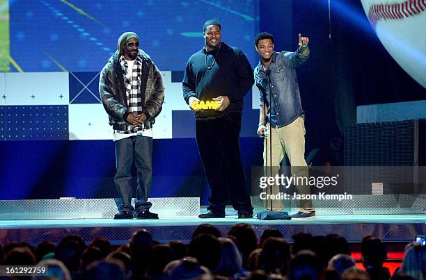 Snoop Lion, Bryant McKinnie and Jacoby Jones speak onstage at the Third Annual Hall of Game Awards hosted by Cartoon Network at Barker Hangar on...