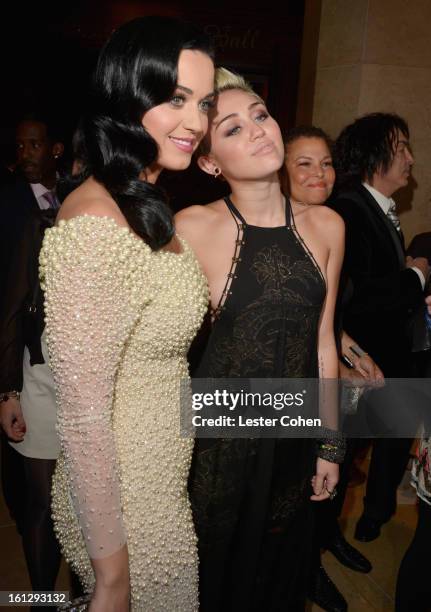 Singers Katy Perry and Miley Cyrus arrive at the 55th Annual GRAMMY Awards Pre-GRAMMY Gala and Salute to Industry Icons honoring L.A. Reid held at...