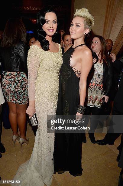 Singers Katy Perry and Miley Cyrus arrive at the 55th Annual GRAMMY Awards Pre-GRAMMY Gala and Salute to Industry Icons honoring L.A. Reid held at...