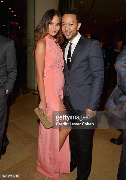 Model Christine Teigen and singer John Legend arrive at the 55th Annual GRAMMY Awards Pre-GRAMMY Gala and Salute to Industry Icons honoring L.A. Reid...